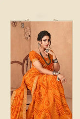 India Silk Bright Orange Chiffon Saree Features A Beautifully Attached Banarasi Border Combining The Softness And Flow Of Chiffon